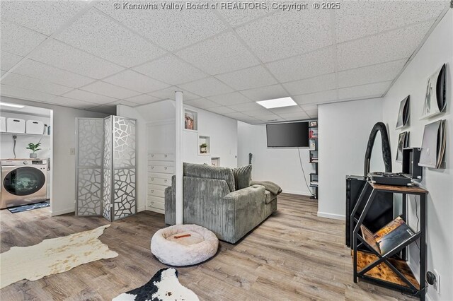 916 Amherst Dr, Charleston, WV 25302 - living area featuring washer / dryer, wood finished floors, and a drop ceiling