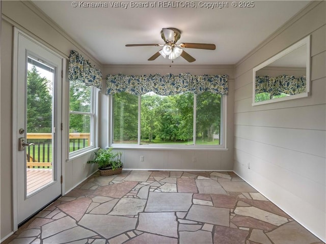 227 Maplewood Ests, Scott Depot, WV 25560 - unfurnished sunroom with plenty of natural light, stone flooring, and crown molding