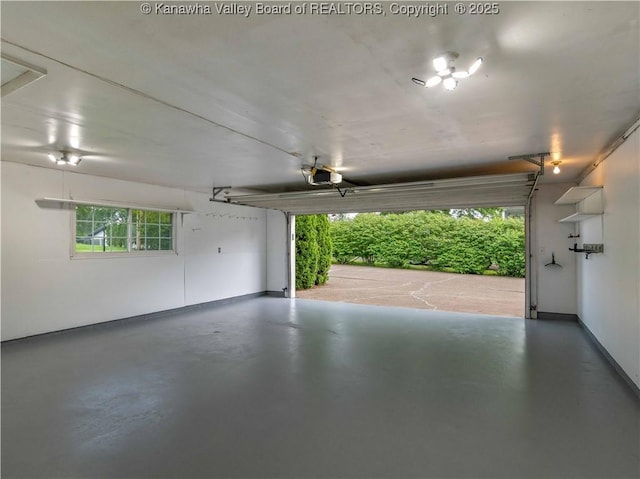 227 Maplewood Ests, Scott Depot, WV 25560 - garage featuring a garage door opener