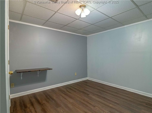 227 Maplewood Ests, Scott Depot, WV 25560 - unfurnished room with dark wood-type flooring, ornamental molding, and a drop ceiling