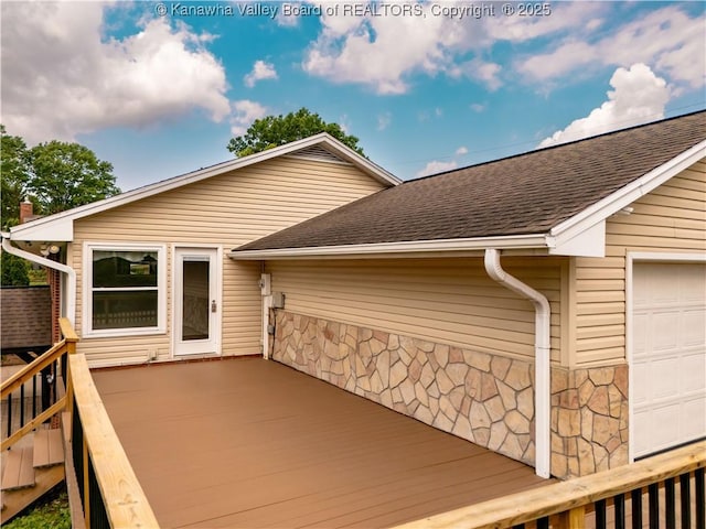 227 Maplewood Ests, Scott Depot, WV 25560 - wooden deck with a garage