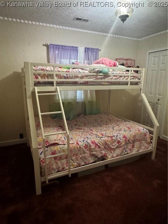 969 Airport Rd, Chapmanville, WV 25508 - bedroom with carpet floors and a textured ceiling