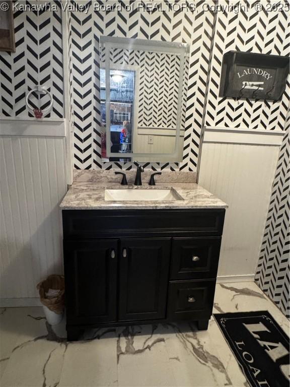 969 Airport Rd, Chapmanville, WV 25508 - bathroom with vanity and marble look tile flooring