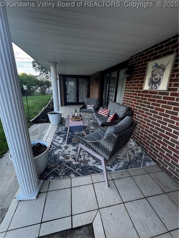 969 Airport Rd, Chapmanville, WV 25508 - view of patio featuring an outdoor living space