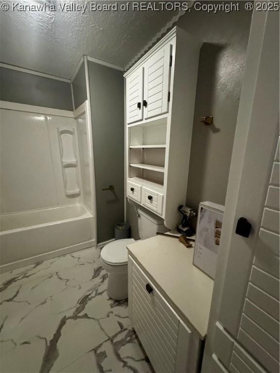 969 Airport Rd, Chapmanville, WV 25508 - full bathroom with marble finish floors, a textured ceiling, and shower / washtub combination