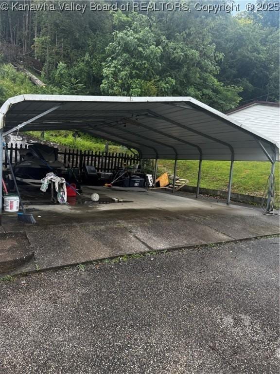 969 Airport Rd, Chapmanville, WV 25508 - view of parking / parking lot featuring a detached carport