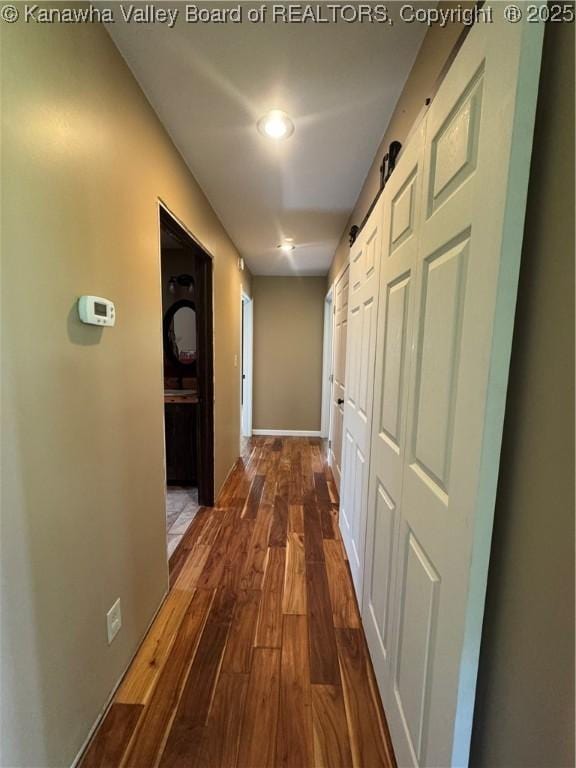 4136 Iva Durst Rd, Leon, WV 25123 - corridor featuring dark wood-style floors and baseboards