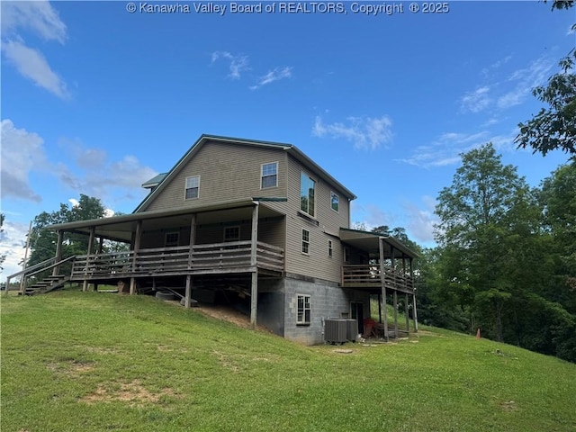 4136 Iva Durst Rd, Leon, WV 25123 - rear view of property featuring a yard