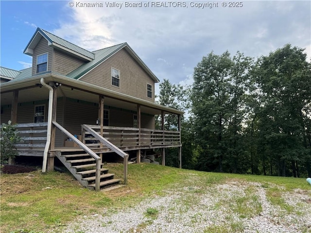 4136 Iva Durst Rd, Leon, WV 25123 - view of property exterior featuring a metal roof and stairway