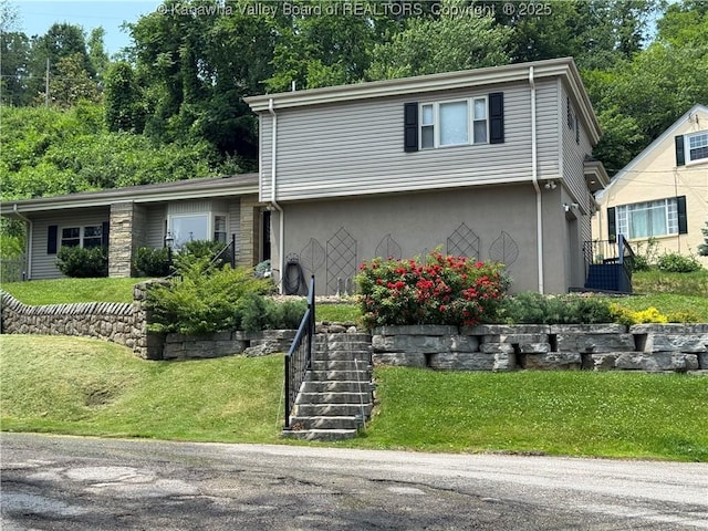 201 Sheridan Cir, Charleston, WV 24315 - view of front of property featuring stairway, stucco siding, and a front yard