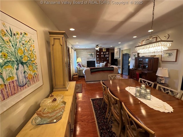 201 Sheridan Cir, Charleston, WV 24315 - dining area featuring a fireplace, dark wood finished floors, a ceiling fan, and recessed lighting