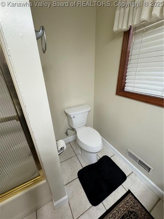 201 Sheridan Cir, Charleston, WV 24315 - bathroom with a shower stall and tile patterned floors