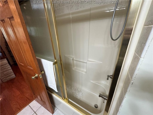 201 Sheridan Cir, Charleston, WV 24315 - bathroom with a shower with shower door and tile patterned floors