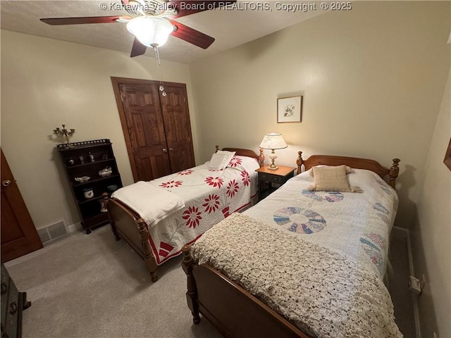 201 Sheridan Cir, Charleston, WV 24315 - bedroom featuring a closet, light colored carpet, and ceiling fan