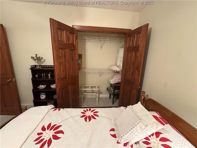 201 Sheridan Cir, Charleston, WV 24315 - bedroom featuring a closet and baseboards