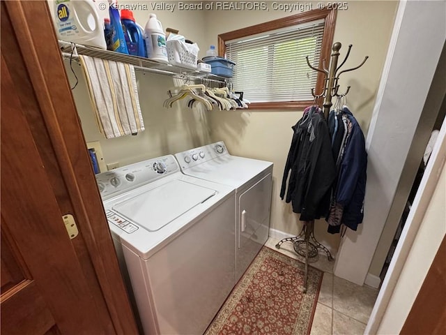 201 Sheridan Cir, Charleston, WV 24315 - laundry room with washing machine and clothes dryer and light tile patterned floors