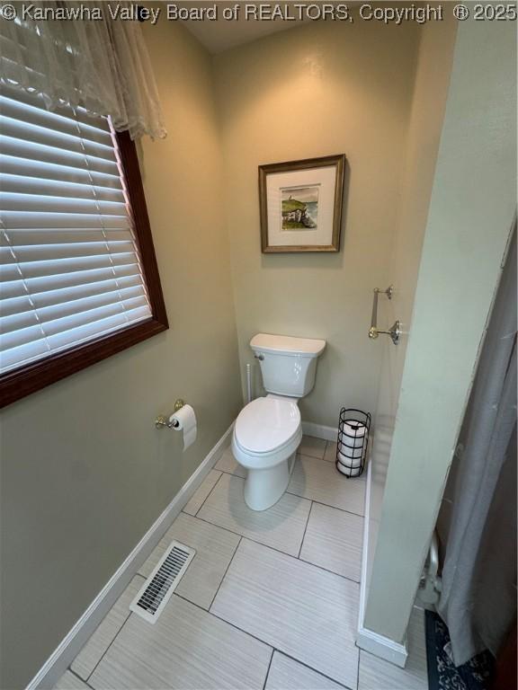 201 Sheridan Cir, Charleston, WV 24315 - bathroom featuring toilet and tile patterned floors