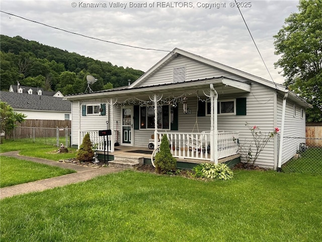 1324 13th St, Nitro, WV 25143 - view of front facade featuring a porch