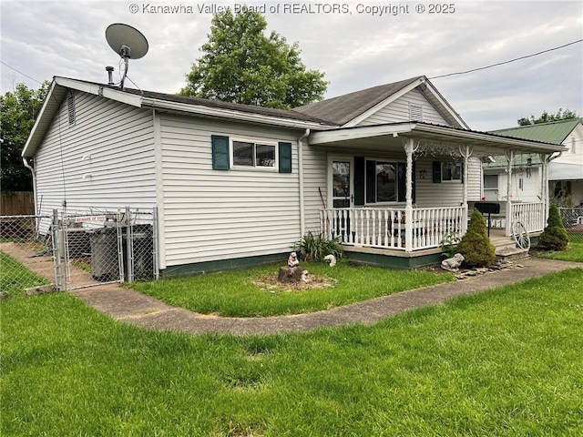 1324 13th St, Nitro, WV 25143 - view of front facade with a porch and roof with shingles