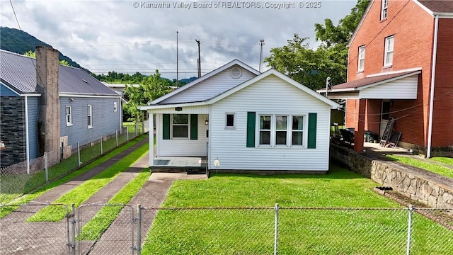108 W Main St, Belle, WV 25015 - rear view of house with a porch and a gate