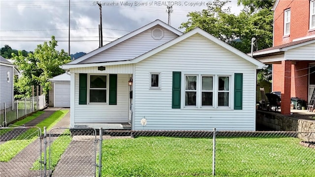 108 W Main St, Belle, WV 25015 - bungalow with a gate, a detached garage, and driveway