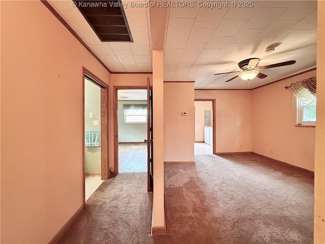 108 W Main St, Belle, WV 25015 - empty room with carpet flooring, crown molding, and a ceiling fan