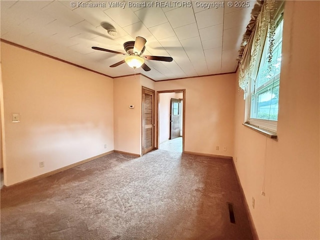 108 W Main St, Belle, WV 25015 - carpeted spare room with crown molding and ceiling fan