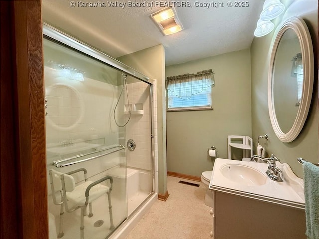 108 W Main St, Belle, WV 25015 - bathroom with a shower stall, vanity, and a textured ceiling