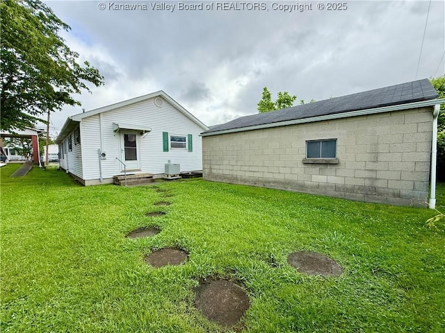 108 W Main St, Belle, WV 25015 - back of house with a lawn and a shingled roof