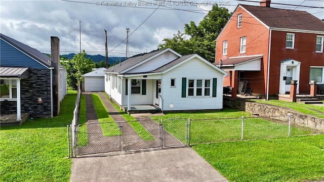 108 W Main St, Belle, WV 25015 - view of front of house with a gate, covered porch, a fenced front yard, and a garage