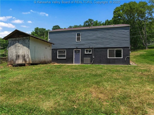 5285 Kelly Rd, Charleston, WV 25313 - back of house with a yard and an outbuilding