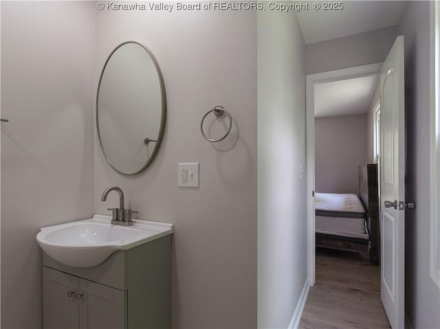 5285 Kelly Rd, Charleston, WV 25313 - bathroom featuring vanity and wood finished floors