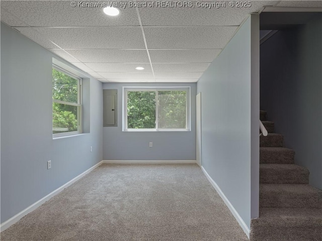 5285 Kelly Rd, Charleston, WV 25313 - carpeted spare room with a paneled ceiling, electric panel, and stairway
