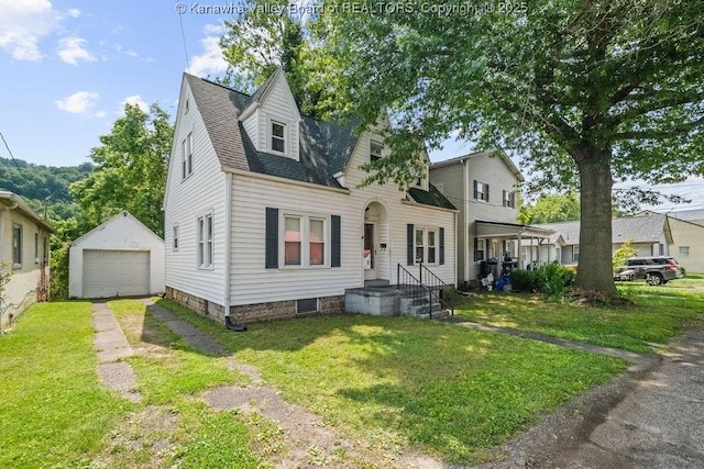 104 E Riverview Dr, Belle, WV 25015 - view of front of property with an outdoor structure, driveway, a front lawn, and a detached garage