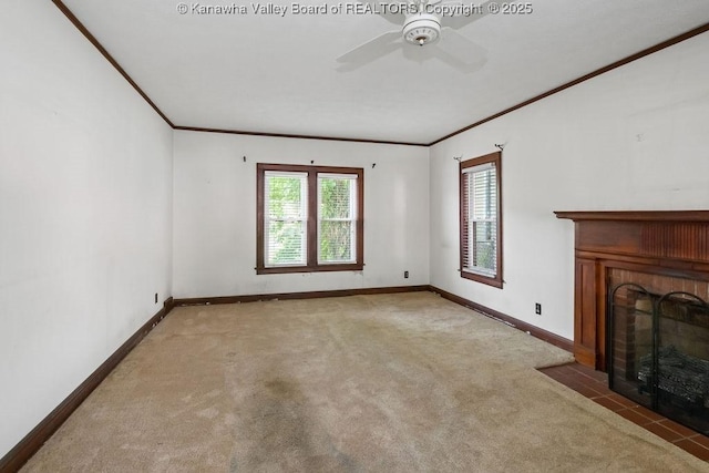104 E Riverview Dr, Belle, WV 25015 - unfurnished living room featuring crown molding, carpet flooring, a fireplace, and a ceiling fan
