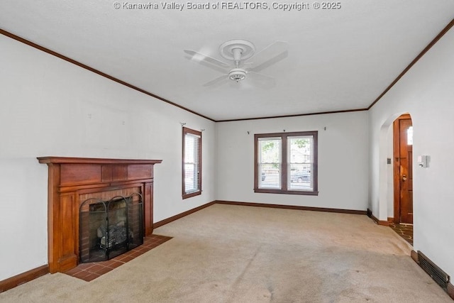 104 E Riverview Dr, Belle, WV 25015 - unfurnished living room featuring light carpet, ornamental molding, ceiling fan, and arched walkways