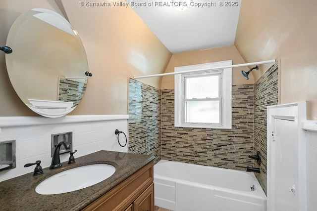 104 E Riverview Dr, Belle, WV 25015 - full bathroom with bathing tub / shower combination, tile walls, and vanity