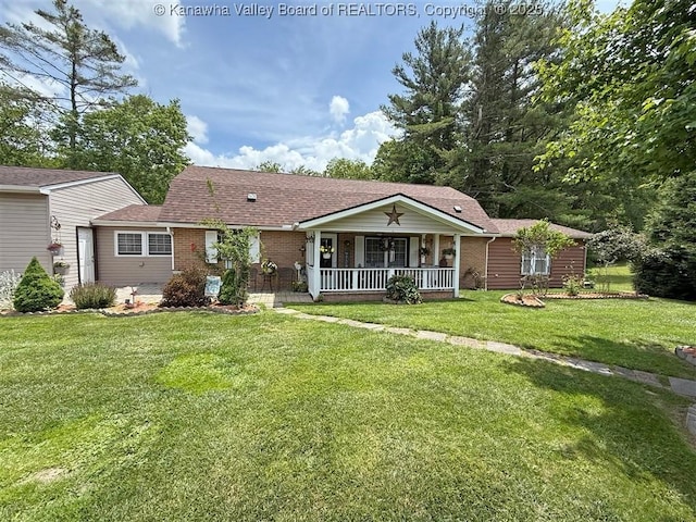 960 Grandview Rd, Daniels, WV 25832 - view of front of home featuring covered porch, a front lawn, brick siding, and a shingled roof