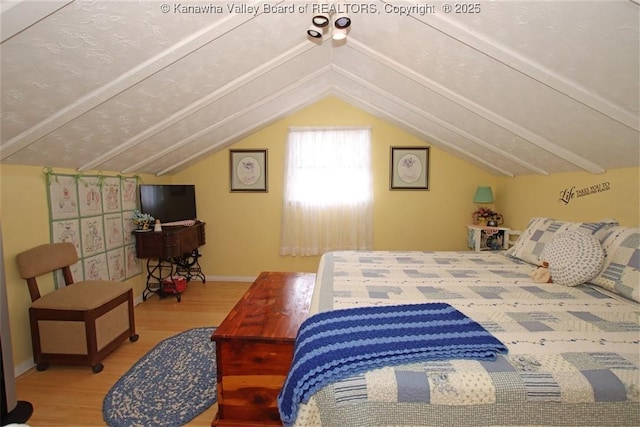 960 Grandview Rd, Daniels, WV 25832 - bedroom with wood finished floors and vaulted ceiling