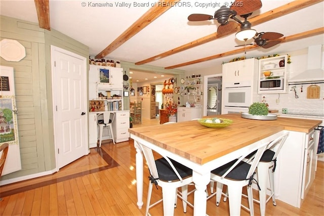 960 Grandview Rd, Daniels, WV 25832 - dining room with beamed ceiling, a ceiling fan, and light wood-type flooring