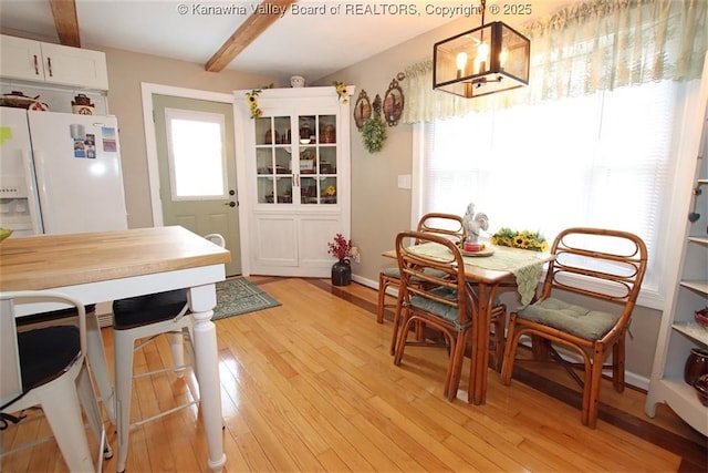960 Grandview Rd, Daniels, WV 25832 - dining area with beam ceiling, a chandelier, and light wood finished floors