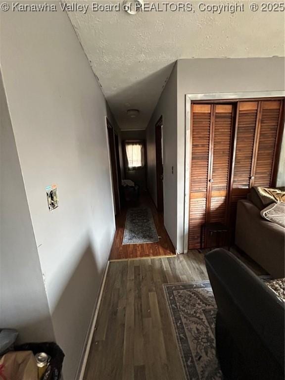 322 16th St, Dunbar, WV 25064 - hallway featuring dark wood-style flooring and a textured ceiling
