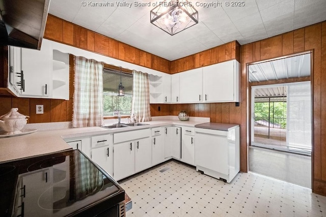 9627 Procious Maysel Rd, Procious, WV 25164 - kitchen with open shelves, electric range oven, light countertops, light flooring, and wood walls