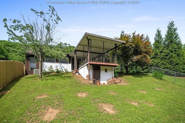 9627 Procious Maysel Rd, Procious, WV 25164 - back of property with a fenced backyard and a deck