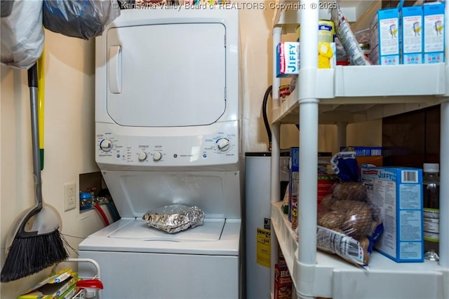 3983 39th St E, Nitro, WV 25143 - laundry room with stacked washer / dryer and water heater