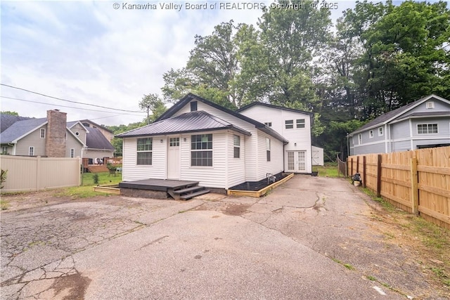 2023 Roxalana Rd, Dunbar, WV 25064 - rear view of house featuring asphalt driveway, french doors, a deck, and a metal roof