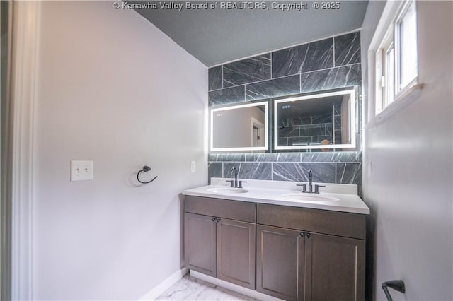 2023 Roxalana Rd, Dunbar, WV 25064 - full bath featuring marble finish floors, double vanity, and decorative backsplash