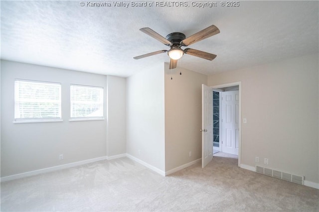 2023 Roxalana Rd, Dunbar, WV 25064 - carpeted spare room featuring ceiling fan and baseboards