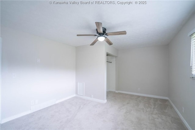 2023 Roxalana Rd, Dunbar, WV 25064 - unfurnished bedroom featuring carpet floors, a closet, and a ceiling fan