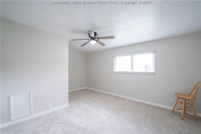 2023 Roxalana Rd, Dunbar, WV 25064 - carpeted empty room with ceiling fan and baseboards